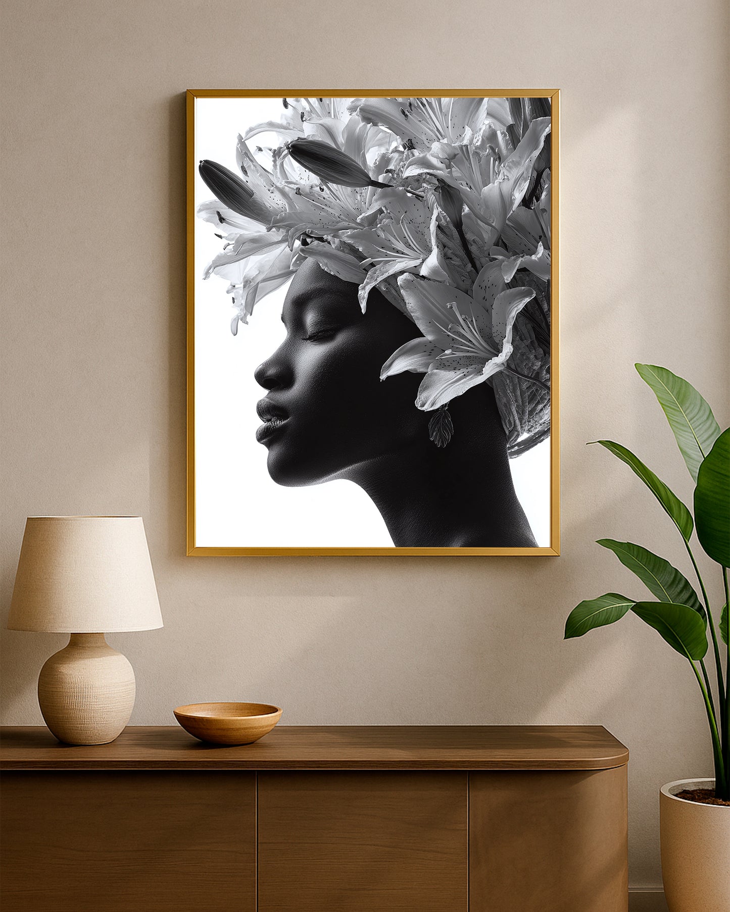 Elegant black and white portrait decor with a woman’s face crowned by sculptural lilies in a calm minimalist composition
