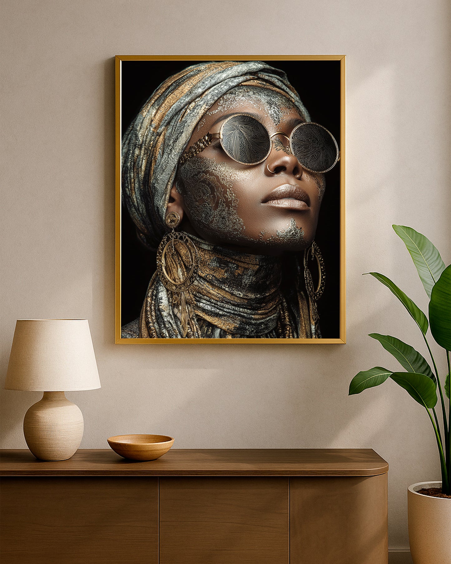 Contemporary portrait decor showing a woman with gold-toned skin accents, patterned sunglasses, and elegant boho styling
