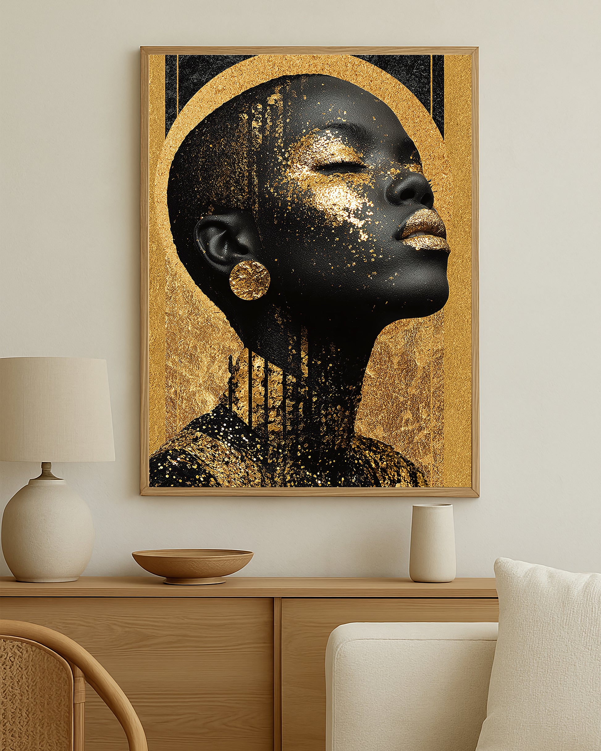 Modern feminine wall art print with luminous gold details across the face and neck in a bold high-contrast composition