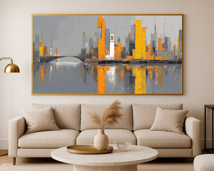 Statement cityscape print with a reflective waterfront, abstract gray skyline, and strong orange architectural highlights across a wide format