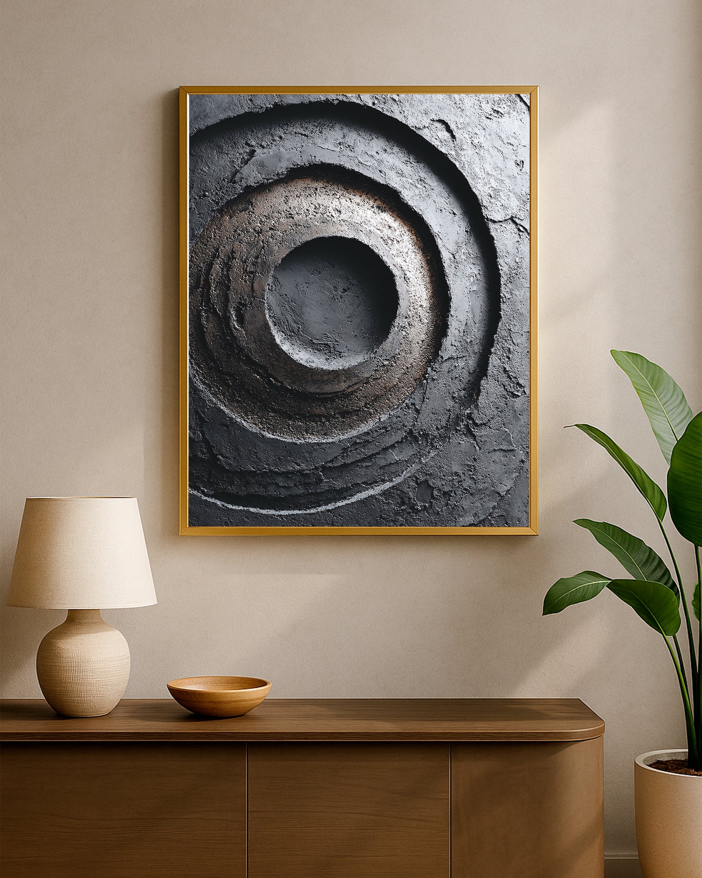 Textured abstract circle print with dark charcoal surface, concentric depth, and sculptural geometric detail.