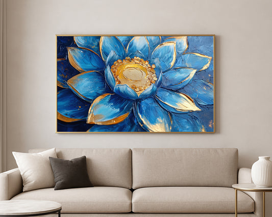 Close-up floral wall art featuring vivid blue petals with metallic gold accents and a raised golden center.