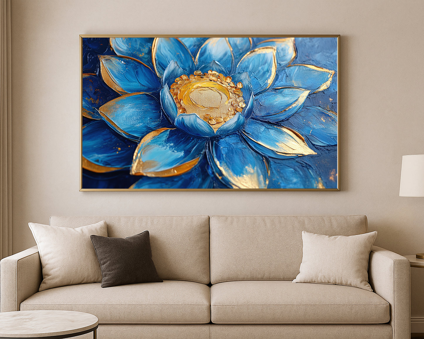 Textured lotus painting with rich blue tones, gold-edged petals, and a luminous gold center on a dark blue surface.