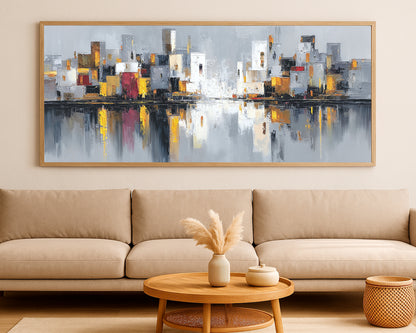 Abstract urban wall decor featuring a refined skyline composition with white and gray towers, soft gold notes, and reflective water