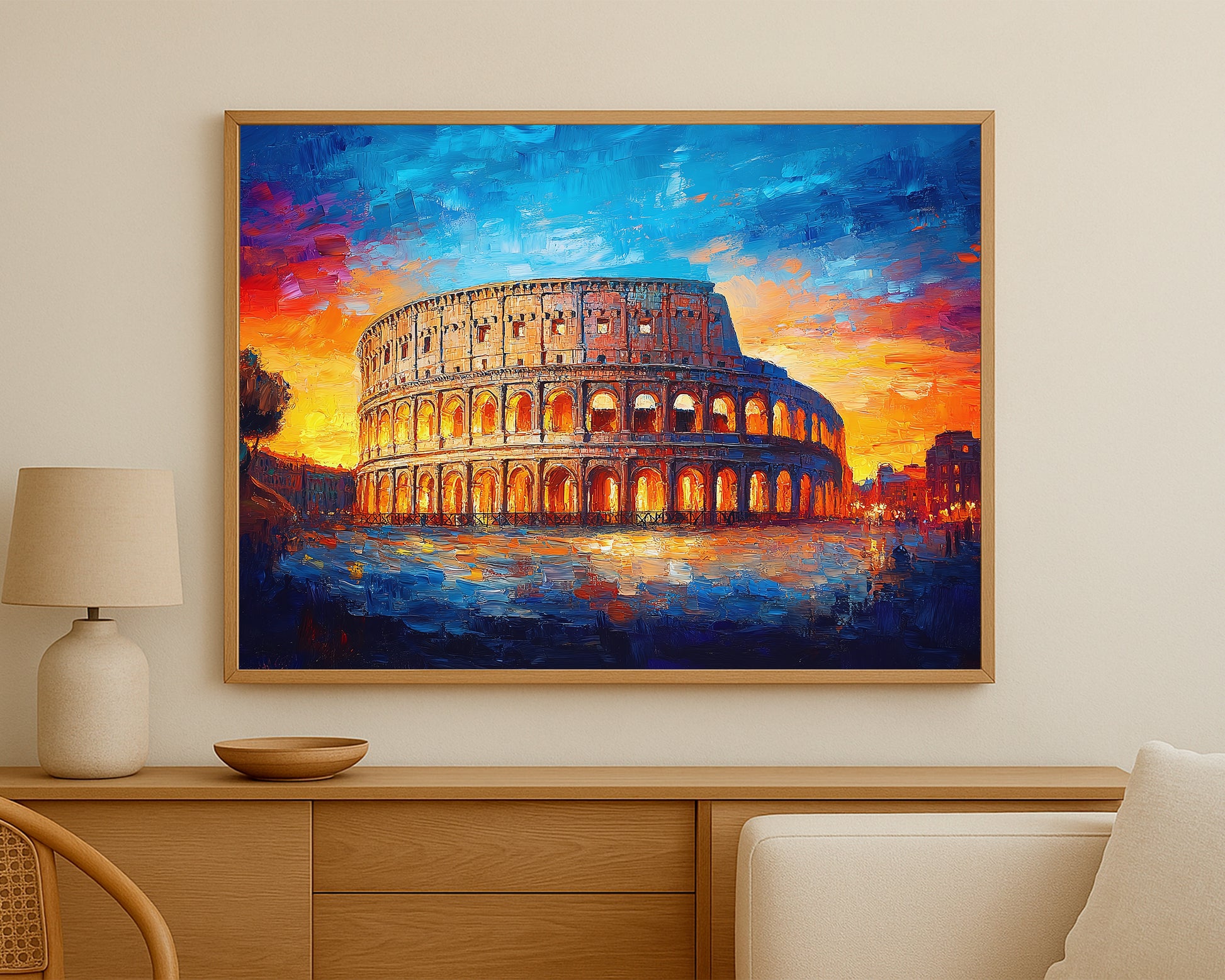 Historic architecture painting of the Colosseum in Rome with fiery sunset colors, bright arches, and a moody blue foreground.