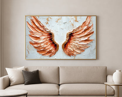 Decorative wing artwork featuring blush and peach-toned angel wings with subtle gold accents on a light neutral backdrop.
