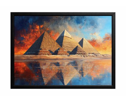 Egyptian pyramids wall art with three pyramids reflected in water beneath a dramatic blue and orange sky