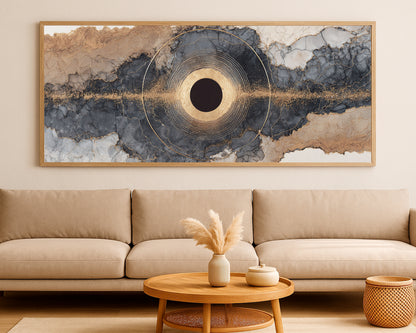 Wide abstract artwork with a glowing dark orb, concentric gold linework, and flowing mineral textures in beige, gray, and cream