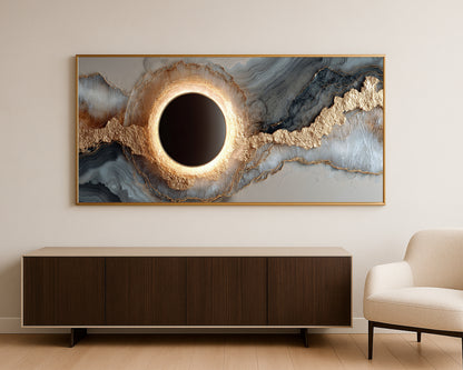 Statement panoramic wall decor showing an eclipse motif embedded in flowing mineral textures with rich gold and neutral contrast