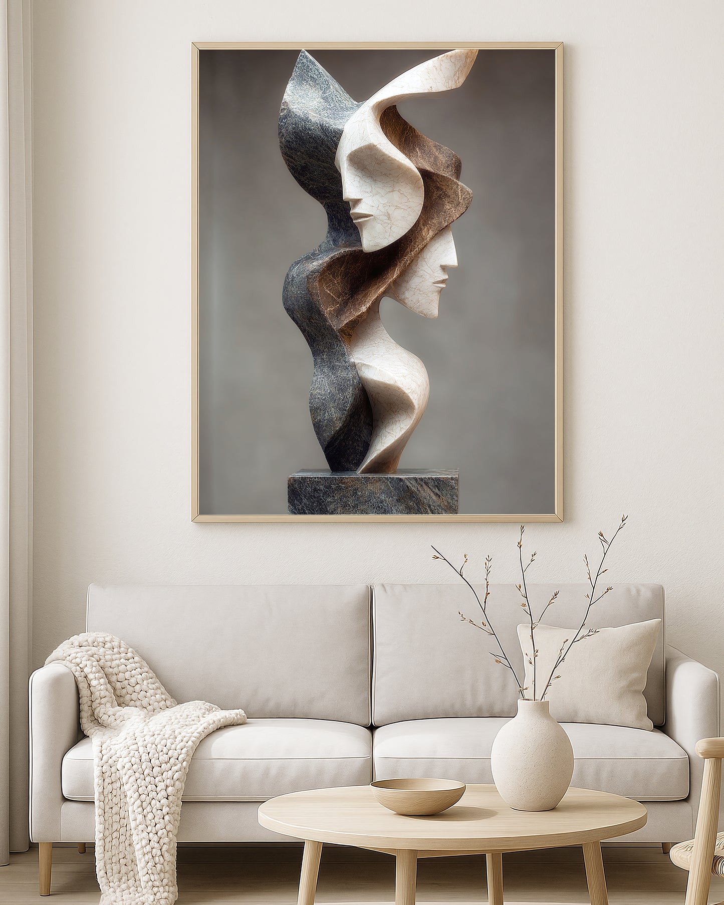 Contemporary portrait wall art with abstract stone-like forms in cream, brown, and charcoal shades