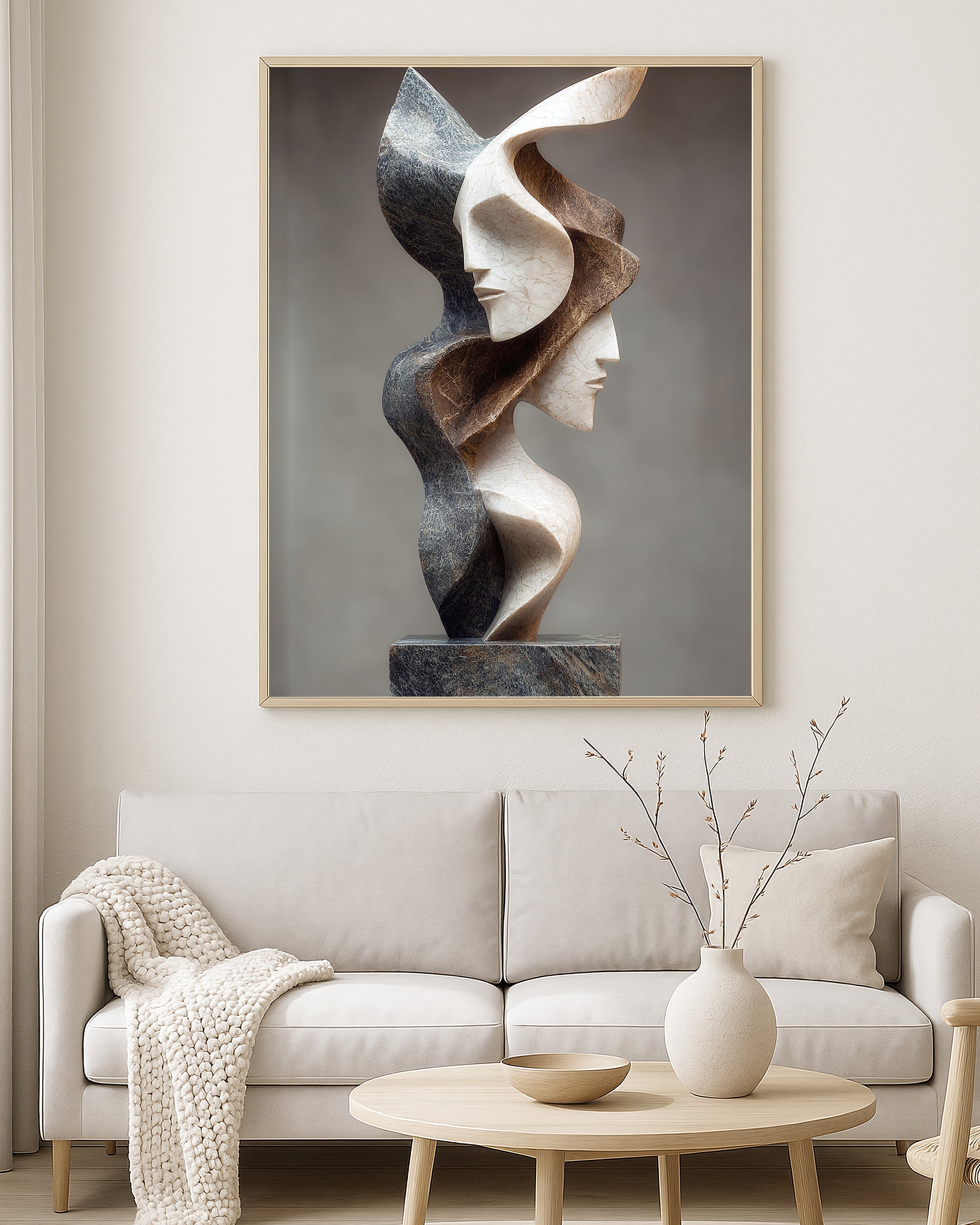 Contemporary portrait wall art with abstract stone-like forms in cream, brown, and charcoal shades
