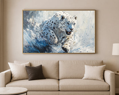 Nature wall art print of a spotted white leopard charging through snow with cool winter colors