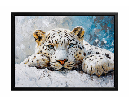 Snow leopard wall art with a front-facing leopard resting in snow against a blue and white textured background