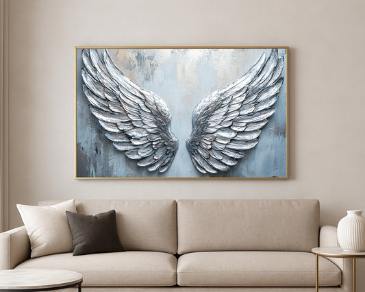 Textured spiritual artwork featuring a symmetrical pair of silver wings with metallic-style highlights