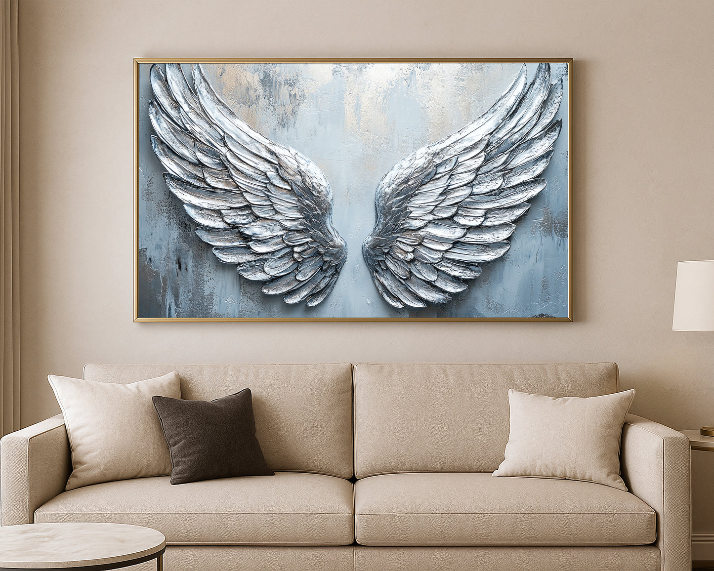 Modern angel wings wall decor with sculptural feather detail in soft gray, white, and blue tones