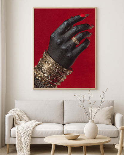 Fashion-inspired artwork featuring an elegant dark hand adorned with layered gold jewelry and dramatic red nail polish
