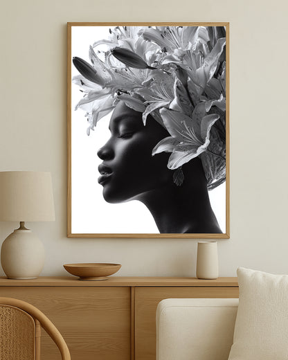 Botanical wall art print showing a graceful female profile with detailed lily blossoms and elegant black and white contrast