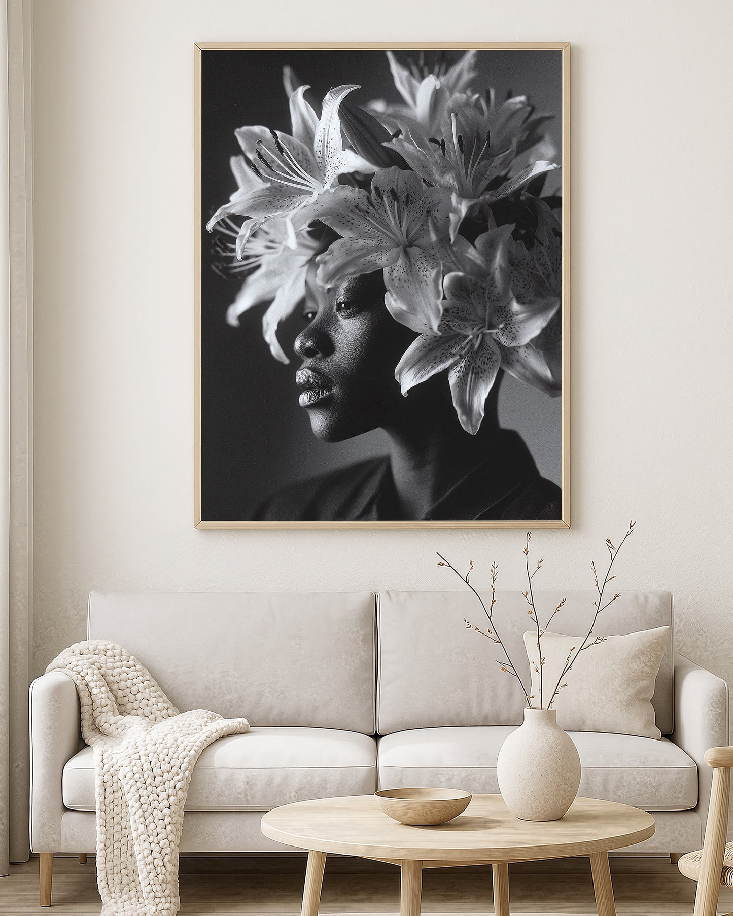 Monochrome portrait artwork of a woman in profile with a dramatic lily flower crown and soft shadowed background