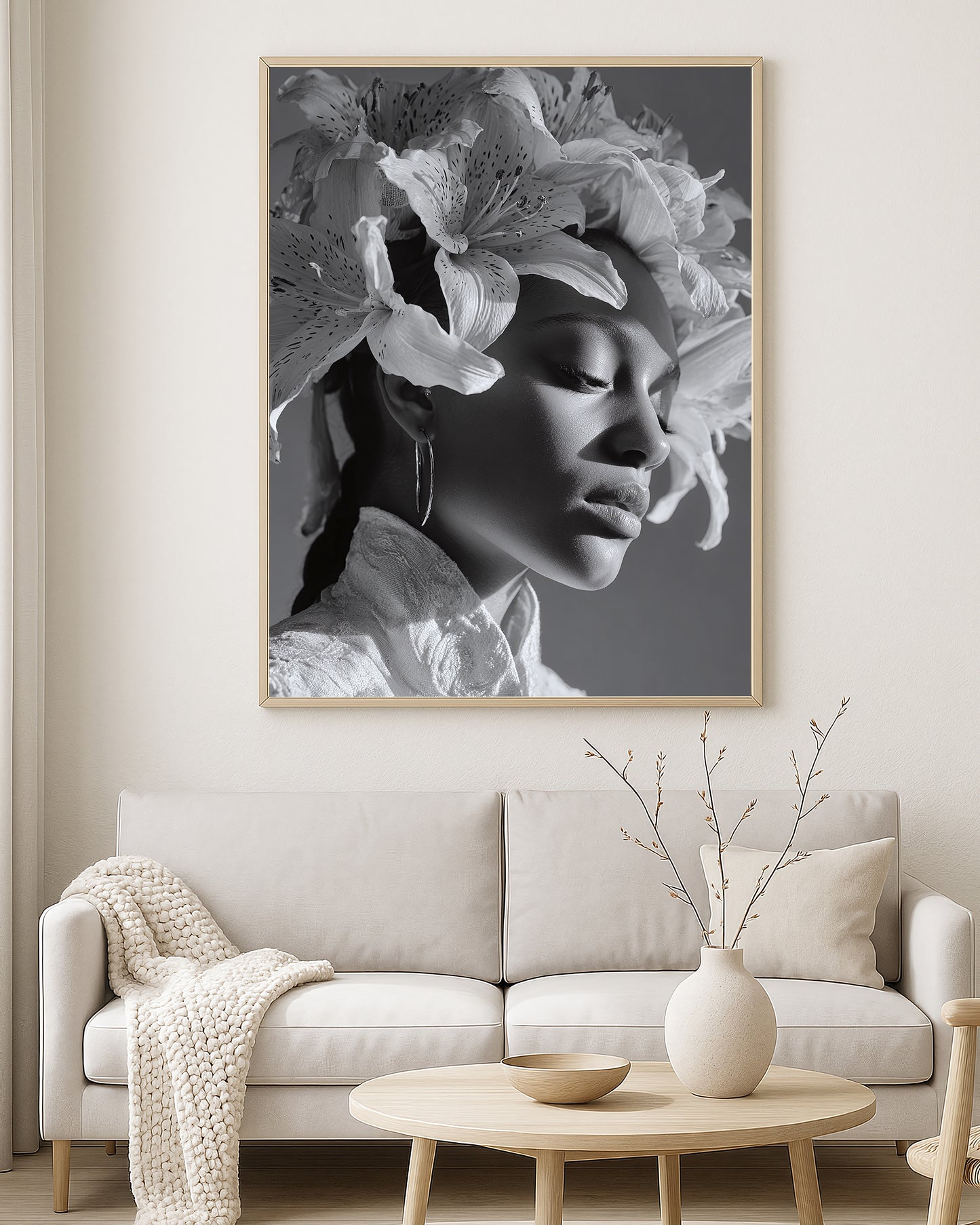 Monochrome portrait artwork of a woman with soft lighting, floral headpiece, and elegant side profile against a gray background