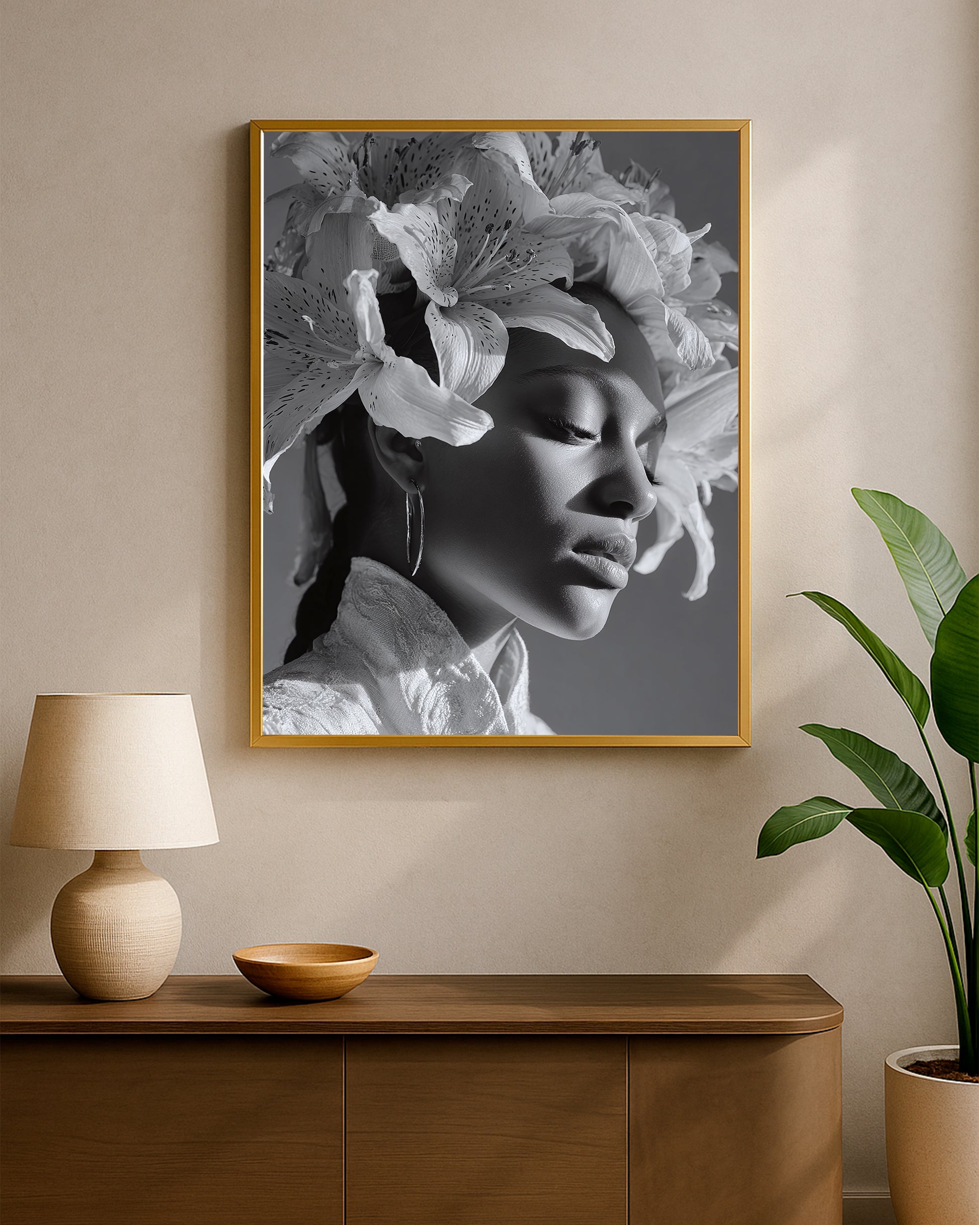 Elegant black and white portrait decor with a woman wearing oversized lilies as a floral crown and a textured light garment