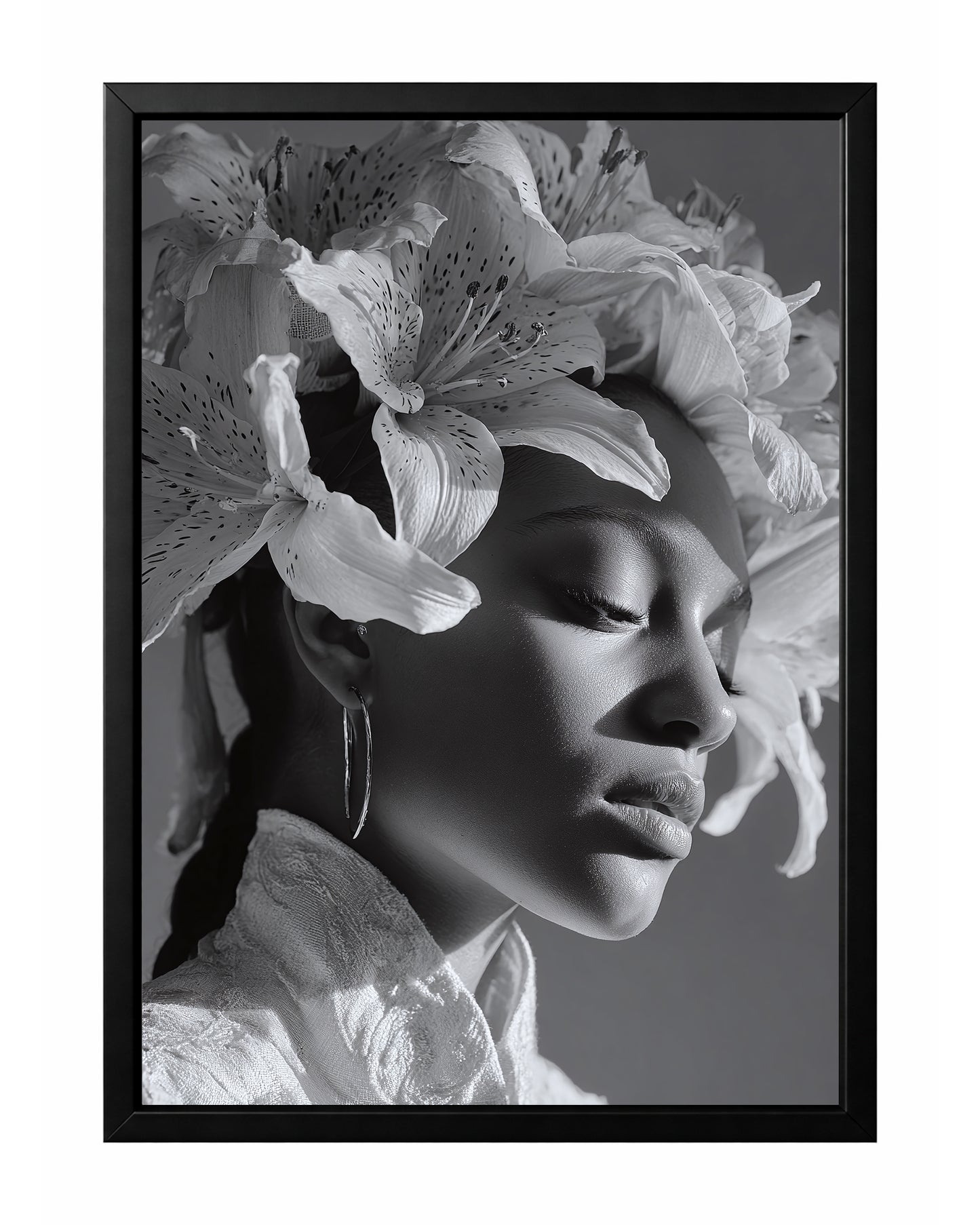 Black and white floral woman portrait wall art featuring a serene side profile with closed eyes and a crown of blooming lilies