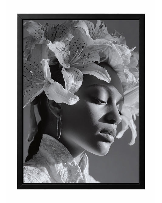 Black and white floral woman portrait wall art featuring a serene side profile with closed eyes and a crown of blooming lilies