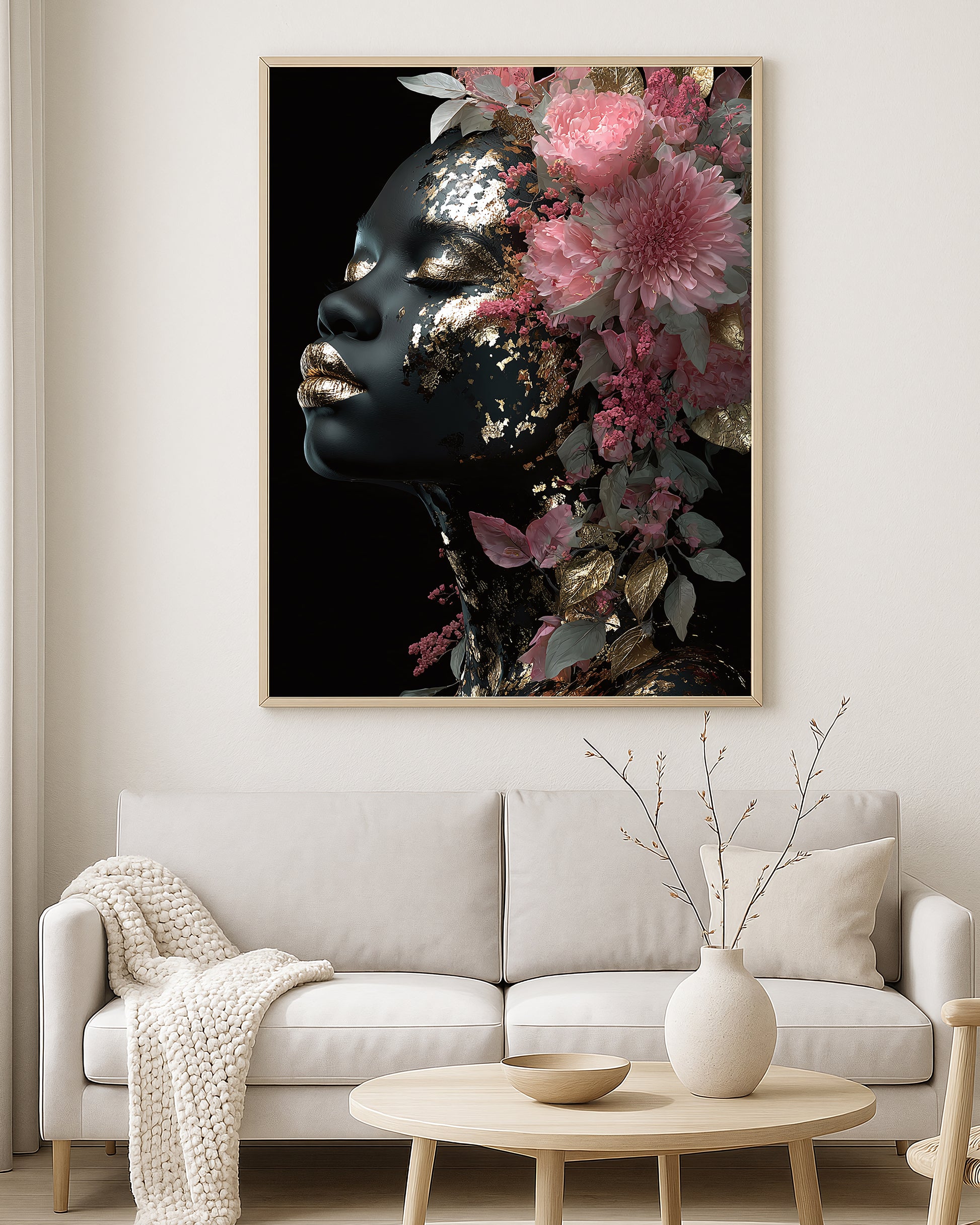 Botanical portrait artwork showing a matte black female profile surrounded by blush pink blooms, pale foliage, and gold details